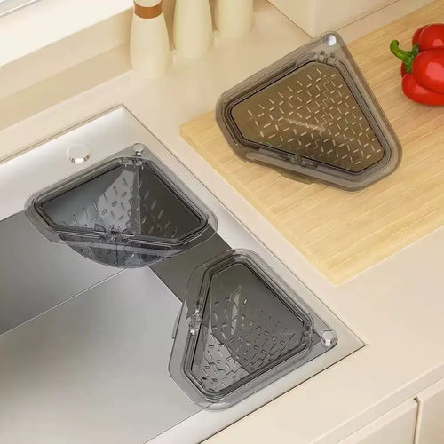 Magnetic draining triangular kitchen sink filter